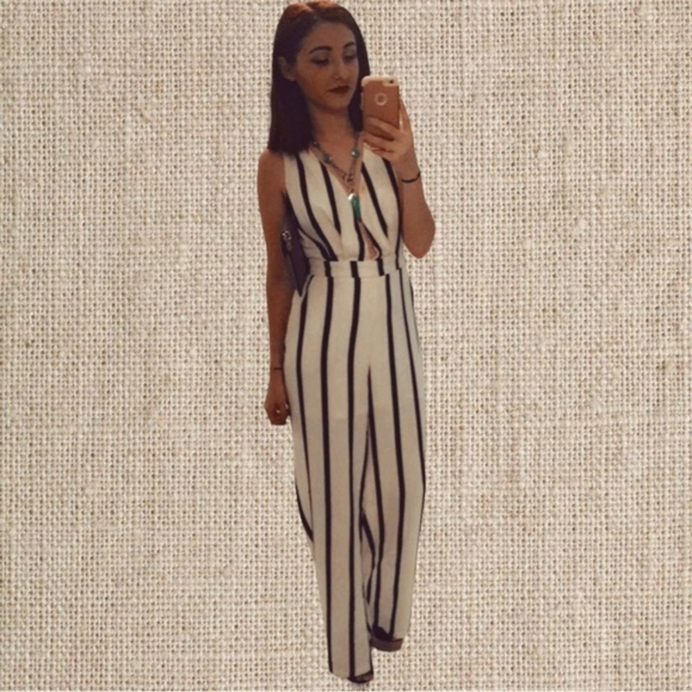 Black and white striped jumpsuit with a deep plunge - Picture 2 of 4